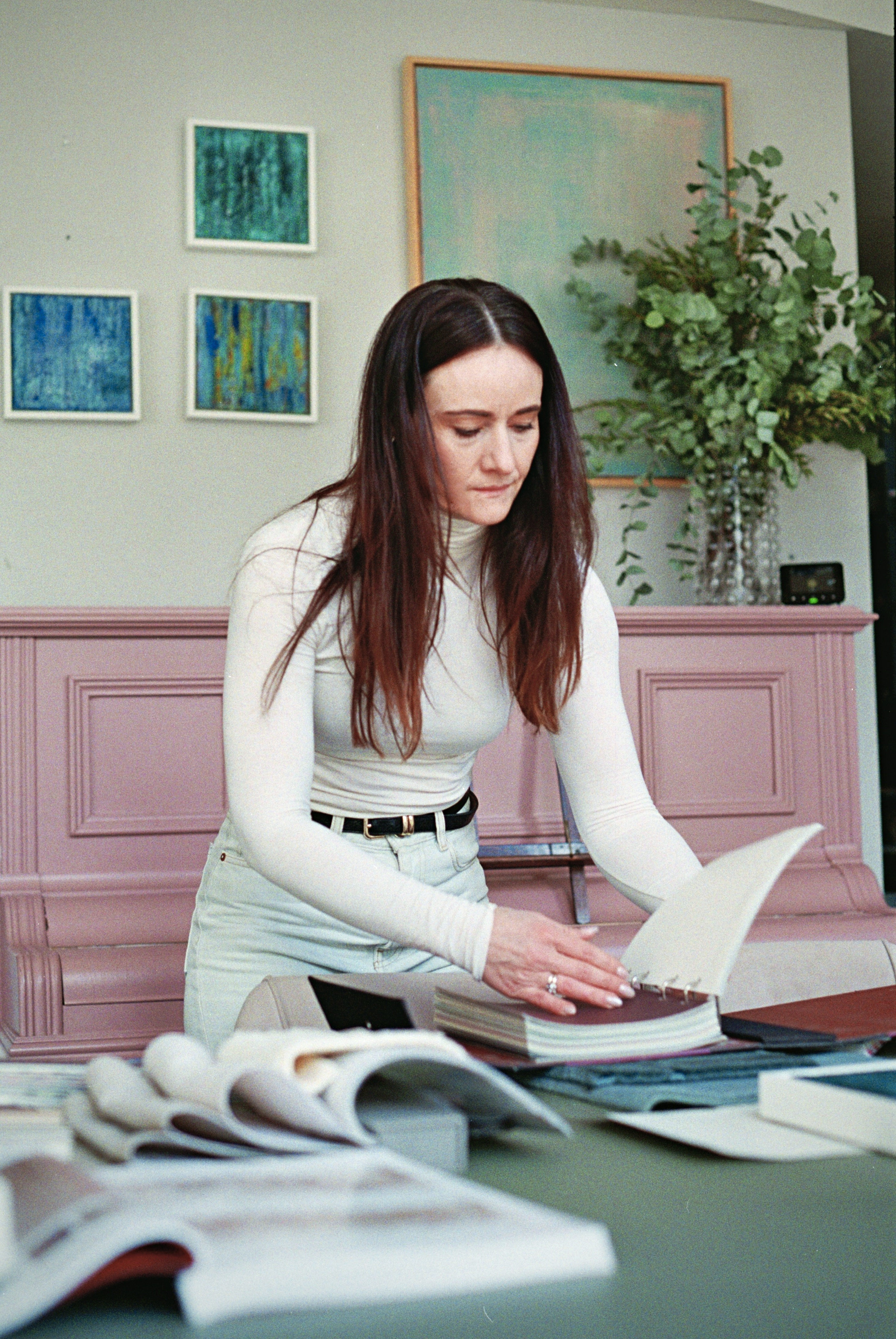 Interior designer reviewing materials — business portrait