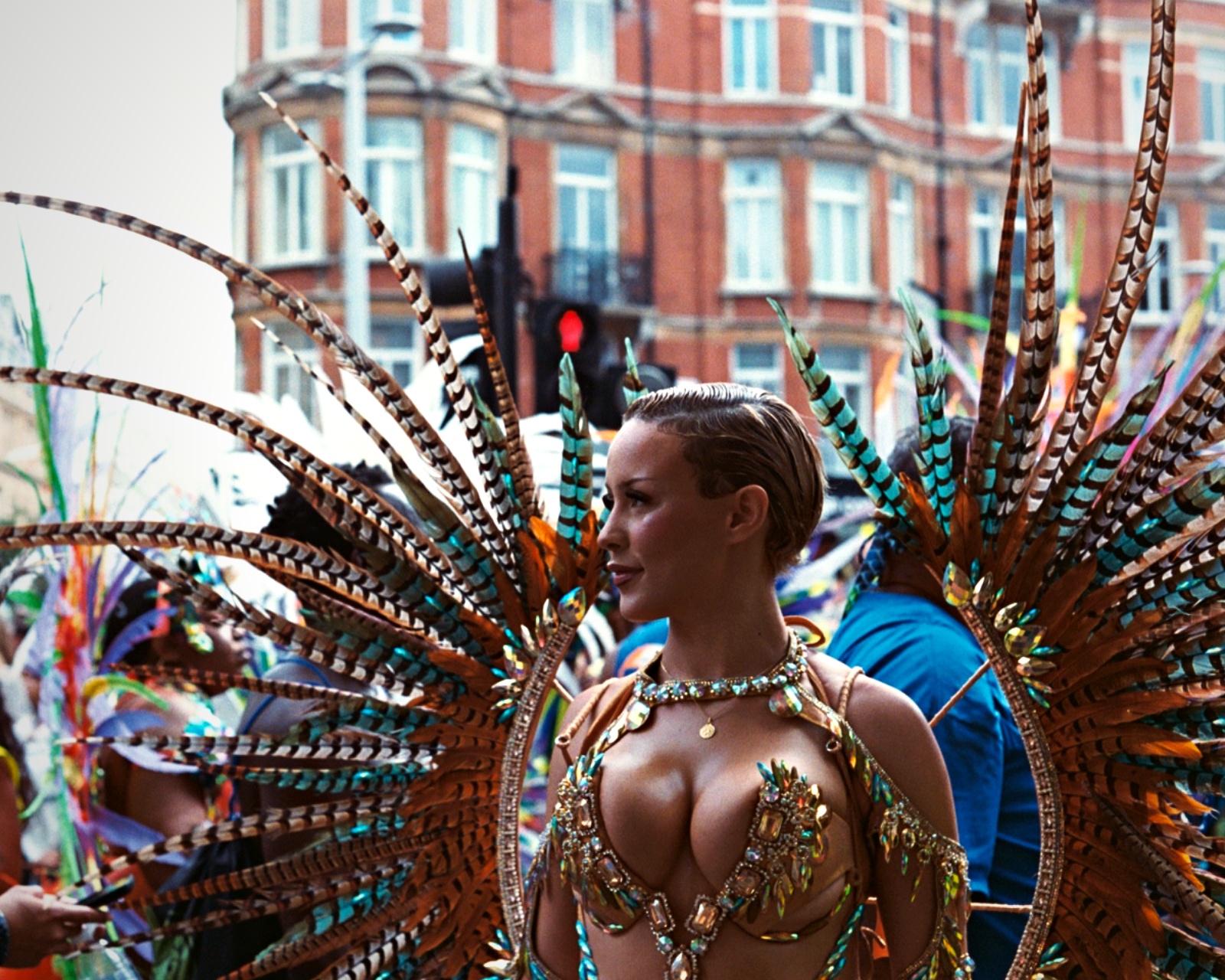 Notting Hill Carnival performer feather headdress London — event photography on film