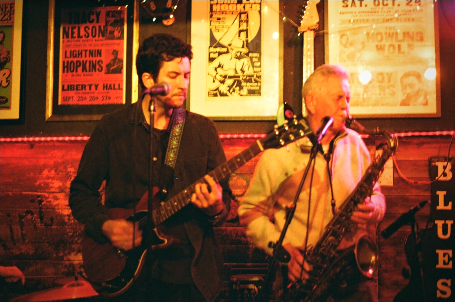 Blues guitarist and saxophonist intimate bar London — live music film photography