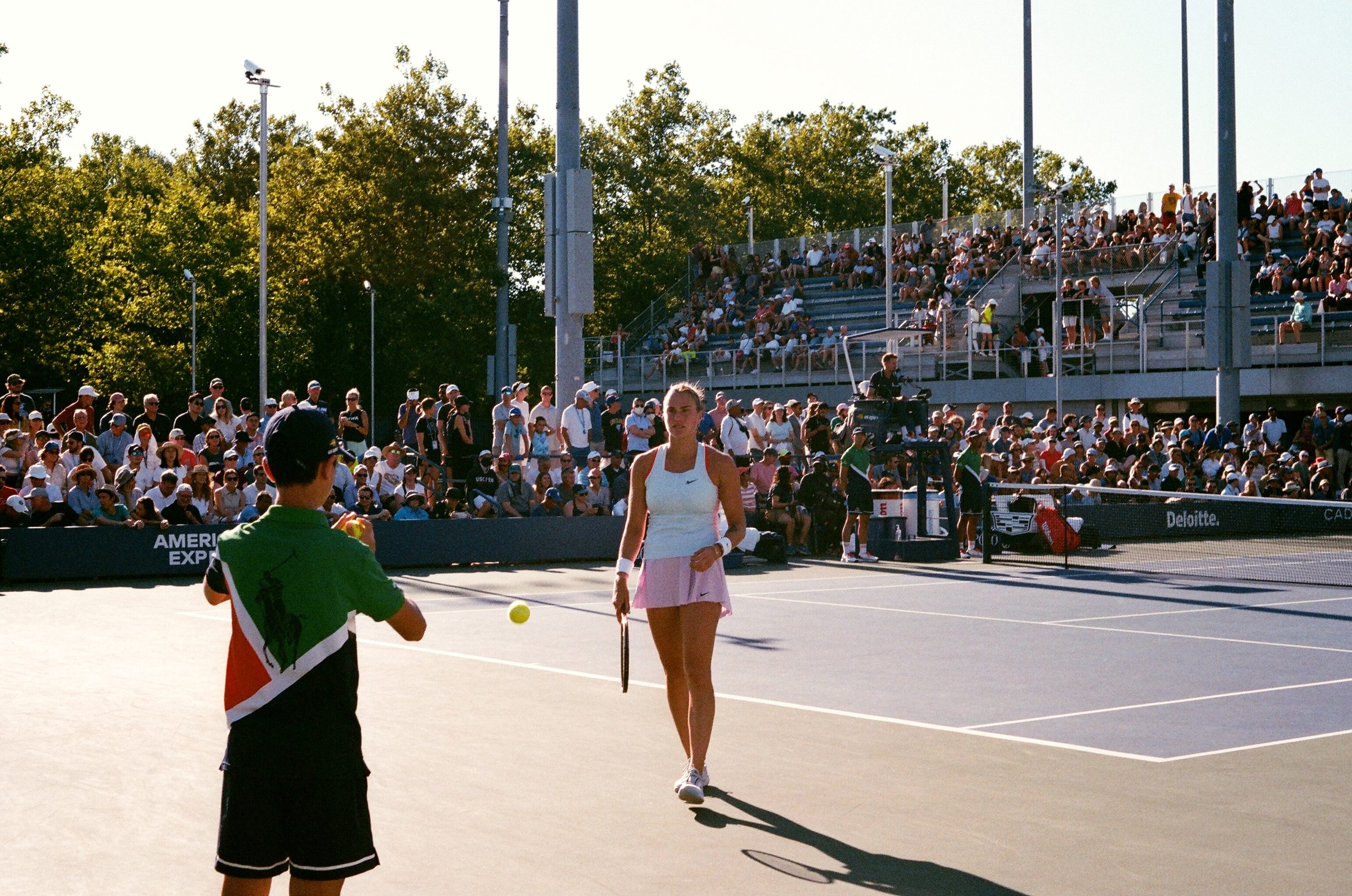 Aryna Sabalenka US Open golden hour crowd — tennis event film photography