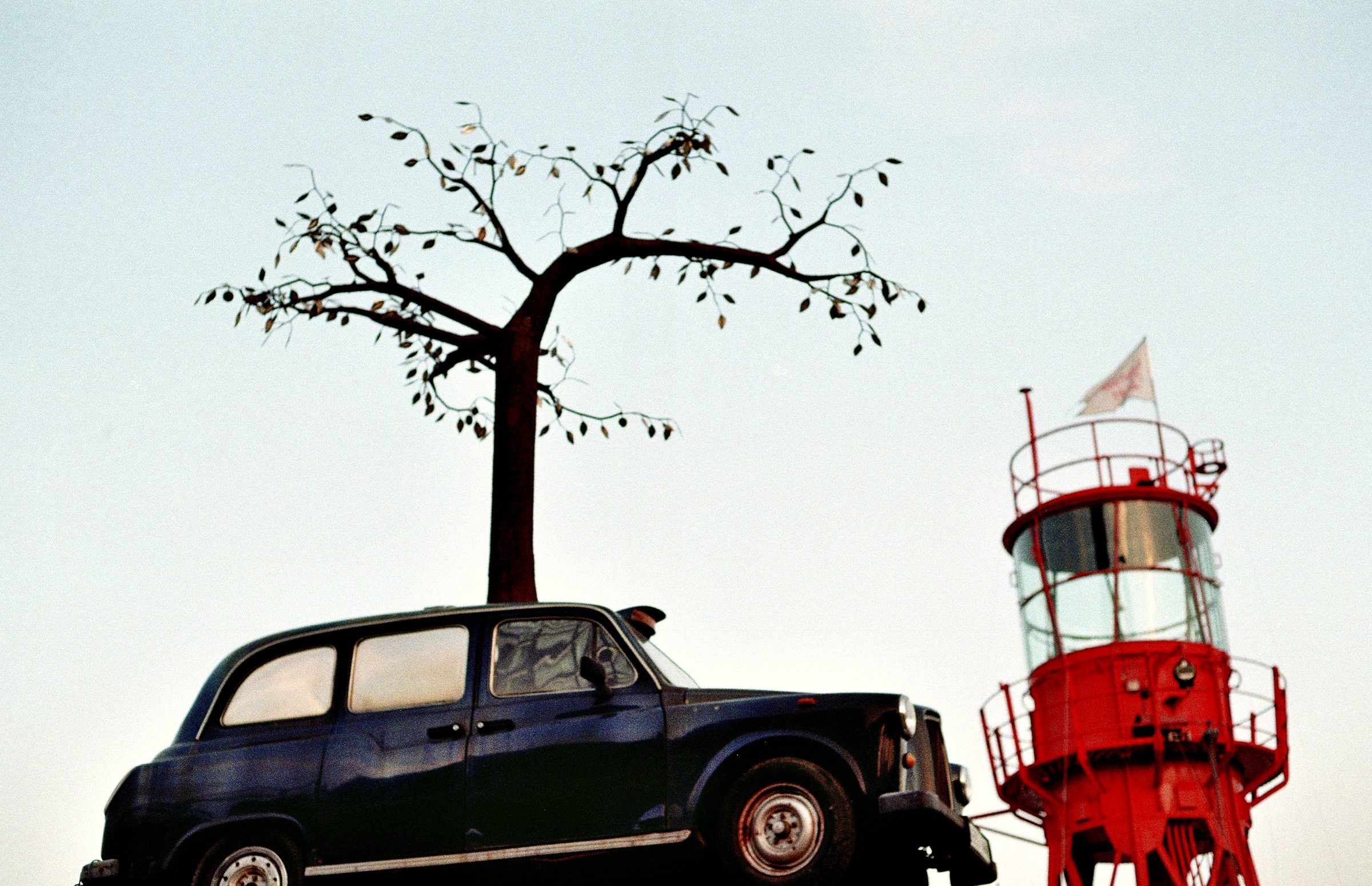 Black cab metal tree red lightship Trinity Buoy Wharf London — art installation film photography