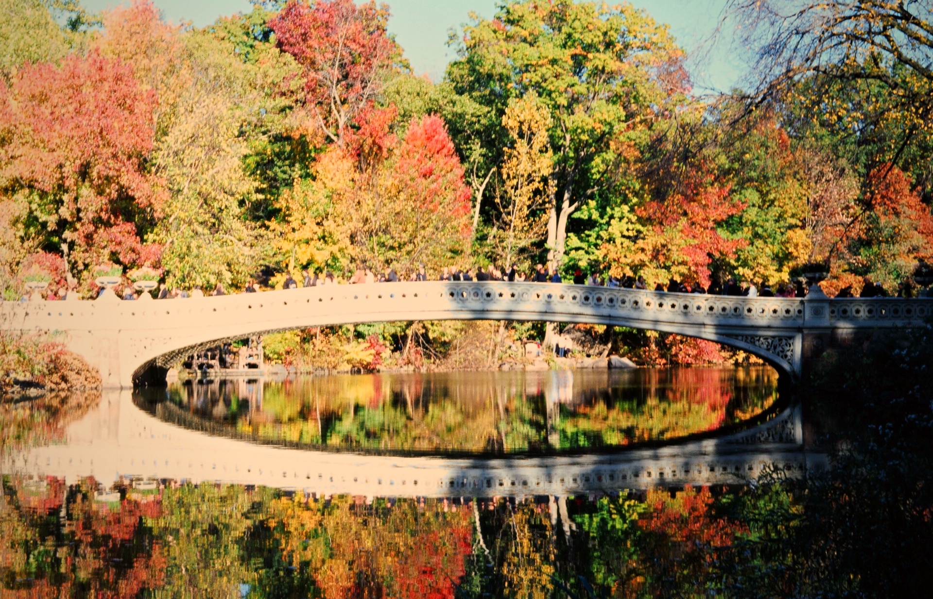 Bow Bridge Central Park autumn colours reflection — analogue film landscape