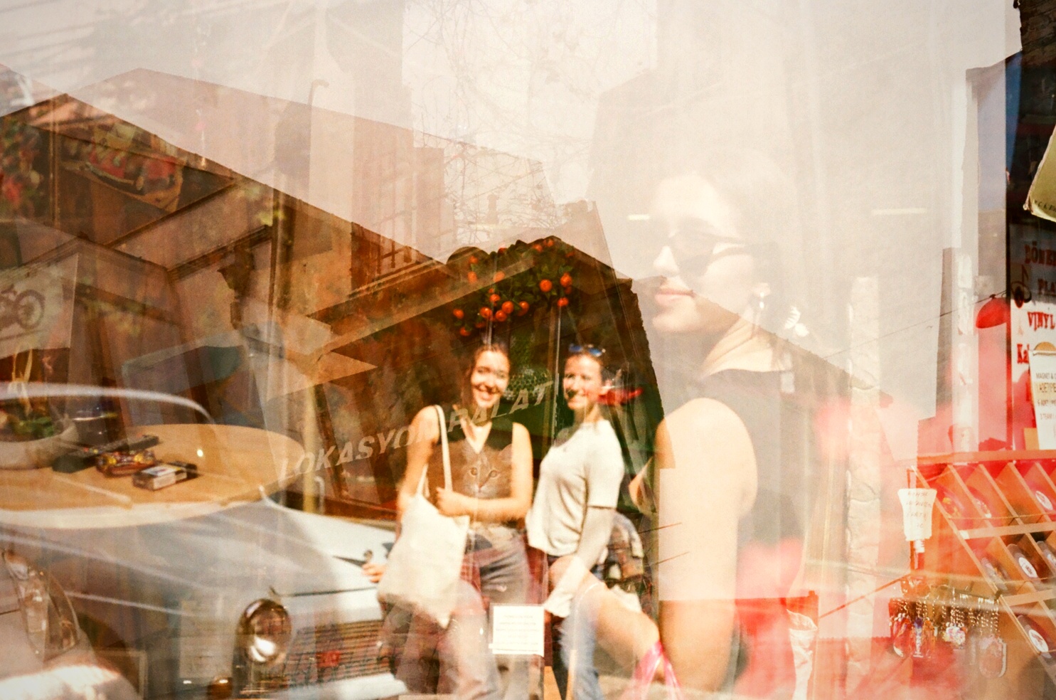 Double exposure film photography street scene vintage car shopfront — analogue film technique