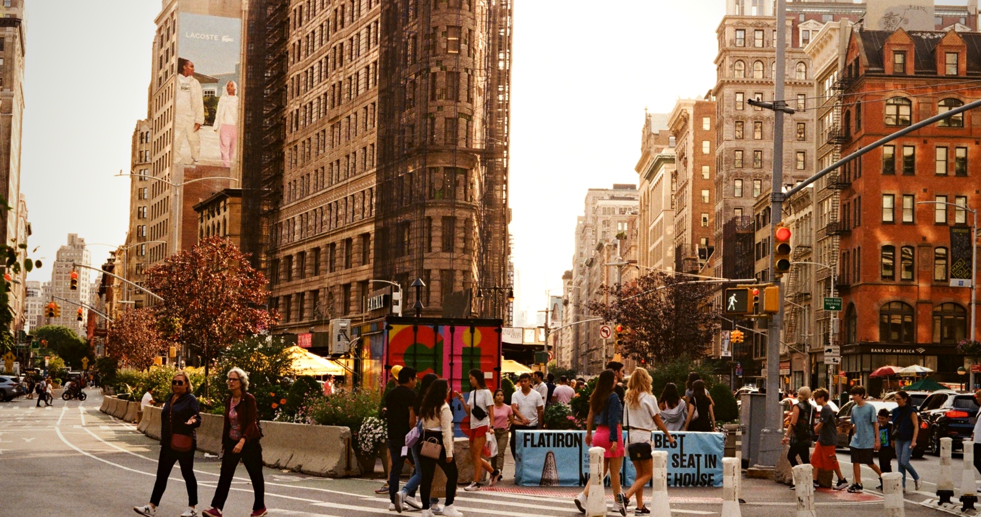 Flatiron Building autumn pedestrians crossing New York — urban film photography